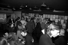 Black-and-white photo of a crowd at a Melville event
