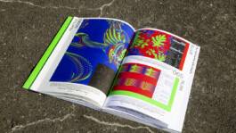 Slanted magazine opened to a typographic spread